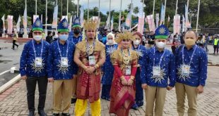 Prosesi pembukaan PON Papua, Kontingen Sumsel memakai Tanjak. (Foto : Rustam Humas Koni Sumsel)