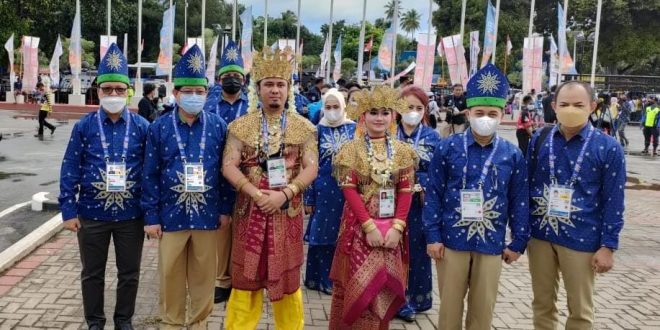 Prosesi pembukaan PON Papua, Kontingen Sumsel memakai Tanjak. (Foto : Rustam Humas Koni Sumsel)