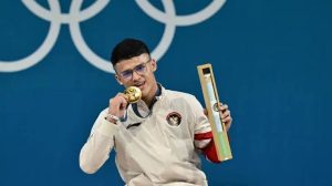 Rizki Juniansyah meraih medali emas di kelas 73 kg putra.