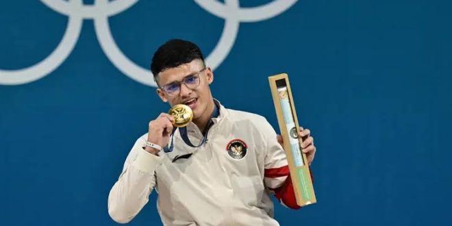 Rizki Juniansyah meraih medali emas di kelas 73 kg putra.