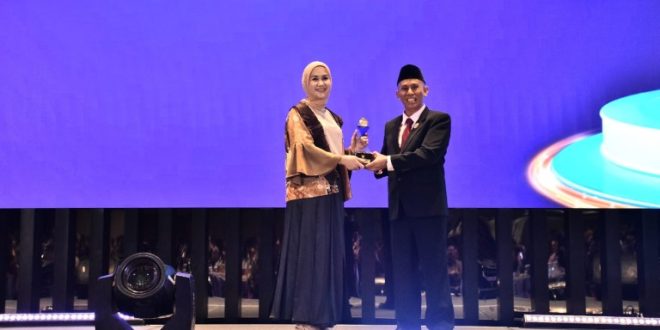Rika Efianti, SE, MM pada acara Malam Anugerah Keterbukaan Informasi Publik Tahun 2024. Bertempat di Hotel Movenpick Jakarta (17/12/2024).