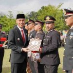 Bupati Ogan Komering Ilir (OKI), H. Muchendi Mahzareki menghadiri sekaligus pimpin apel peringatan Hari Ulang Tahun Bhayangkara ke-79 tahun 2025.