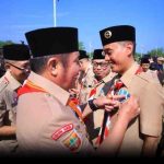 Bupati Ogan Komering Ilir, H. Muchendi meraih tanda penghargaan lencana Lencana Panca Warsa III Gerakan Pramuka.