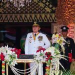 Suasana khidmat menyelimuti halaman Griya Agung Palembang saat peringatan Hari Ulang Tahun (HUT) ke-80 Kemerdekaan Republik Indonesia, Minggu (17/8/2025).