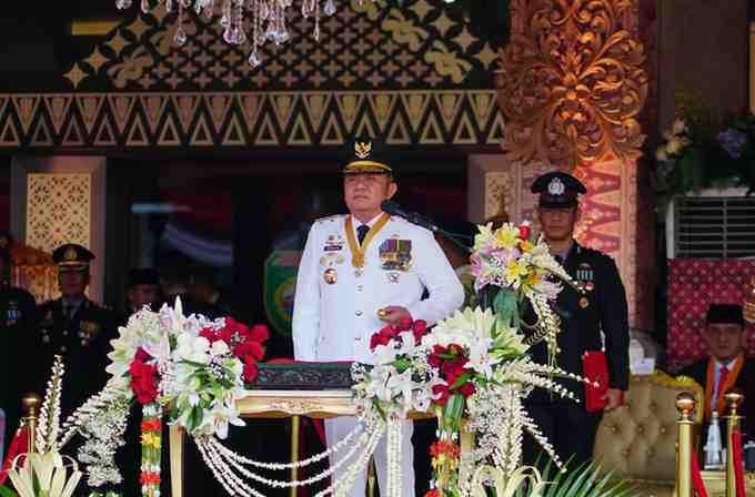 Suasana khidmat menyelimuti halaman Griya Agung Palembang saat peringatan Hari Ulang Tahun (HUT) ke-80 Kemerdekaan Republik Indonesia, Minggu (17/8/2025).