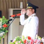 Bupati Muba, H M Toha Tohet SH, bertindak sebagai Inspektur Upacara.