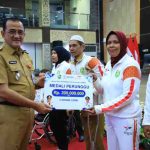 H. Edward Candra, mewakili Gubernur Sumsel H. Herman Deru bertempat di Graha Auditorium Bina Praja, Senin (13/10/2025).