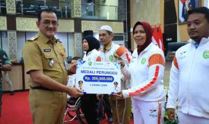 H. Edward Candra, mewakili Gubernur Sumsel H. Herman Deru bertempat di Graha Auditorium Bina Praja, Senin (13/10/2025).