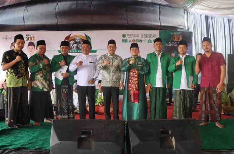 Semaraknya peringatan Hari Lahir (Harlah) Nahdlatul Ulama (NU) Tahun 2026 menggema di Halaman Kampus An-Nahdlah RT 008 Dusun II (Pauh), Desa Simpang Tungkal