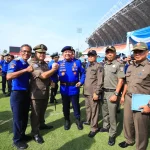 Ribuan personel mengikuti upacara HUT Damkar, Satpol PP, dan Satlinmas 2026 di Jakabaring. (MUSINEWS.ID/TRI)