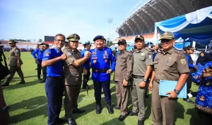 Ribuan personel mengikuti upacara HUT Damkar, Satpol PP, dan Satlinmas 2026 di Jakabaring. (MUSINEWS.ID/TRI)