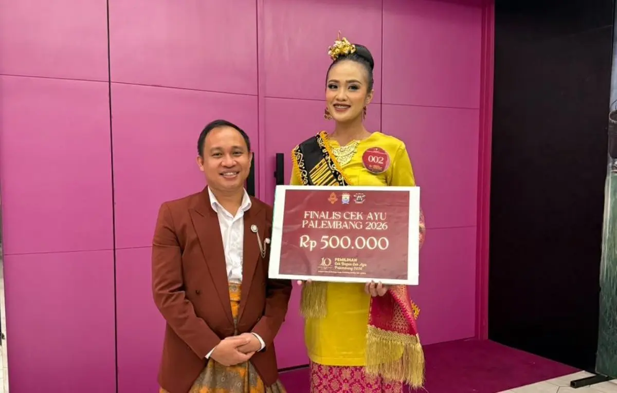 Irma Rismawati bersama Ferry Kurniawan, Manajer Marketing dan BMedia Universitas Bina Darma. (foto : binadarma.ac.id)