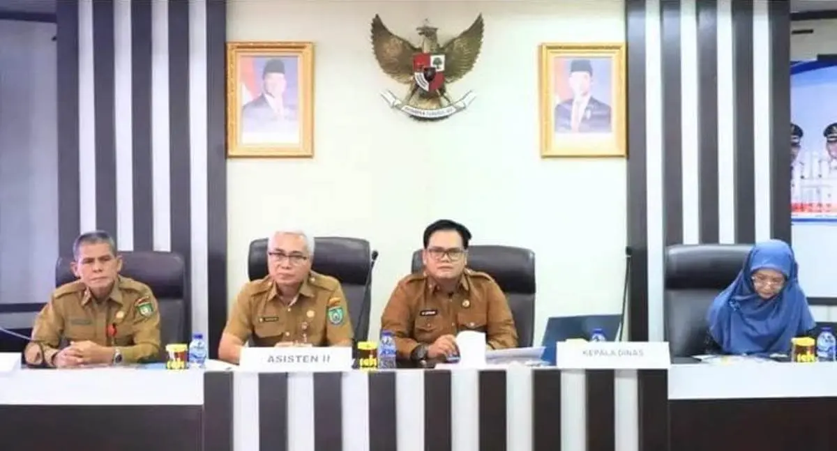 Rapat Koordinasi Lintas Sektor Program JKN UHC yang dihadiri Asisten II Bidang Perekonomian dan Pembangunan Setda Kota Prabumulih, Wawan Gunawan, Ak., CA., mewakili Wali Kota Prabumulih, H. Arlan.