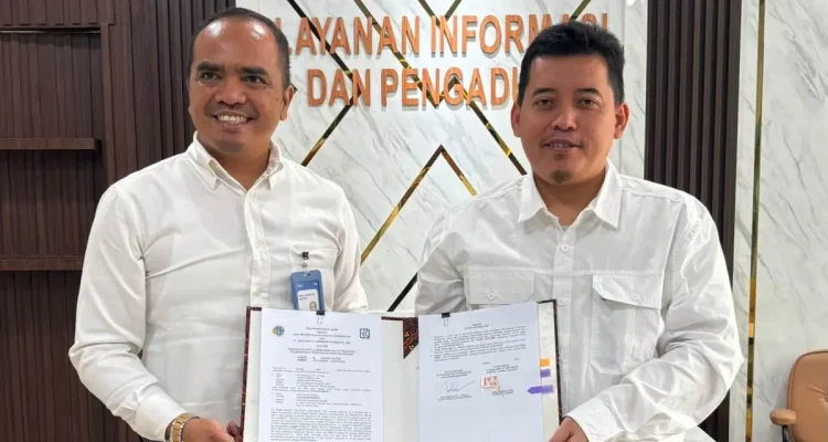 penandatanganan Perjanjian Kerja Sama (PKS) terkait Penerbitan Kartu Kredit Pemerintah (KKP) untuk pengelolaan Uang Persediaan (UP) di Kota Bangko. (MUSINEWS.ID/HAIRUDIN)