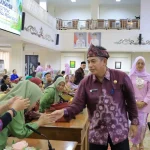 Asisten II Bidang Perekonomian dan Pembangunan Sekretariat Daerah (Setda) Kota Palembang, Isnaini Madani, membuka secara resmi Sosialisasi Peraturan Menteri Lingkungan Hidup Nomor 5 Tahun 2025 tentang Penyelenggaraan Program Adiwiyata. (MUSINEWS.ID/HAIRUDIN)