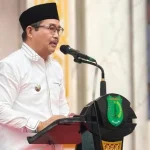 Wakil Bupati Kabupaten Musi Banyuasin (Muba), Abdur Rohman Husen, menghadiri Haflah Khotmil Qur’an ke-XII sekaligus peringatan Hari Santri Nasional Zona 4 Kabupaten Muba di Pondok Pesantren Annur, Desa Gajah Mati, Kecamatan Babat Supat, Kamis, tanggal 22 Oktober 2026. (MUSINEWS.ID/TRI)